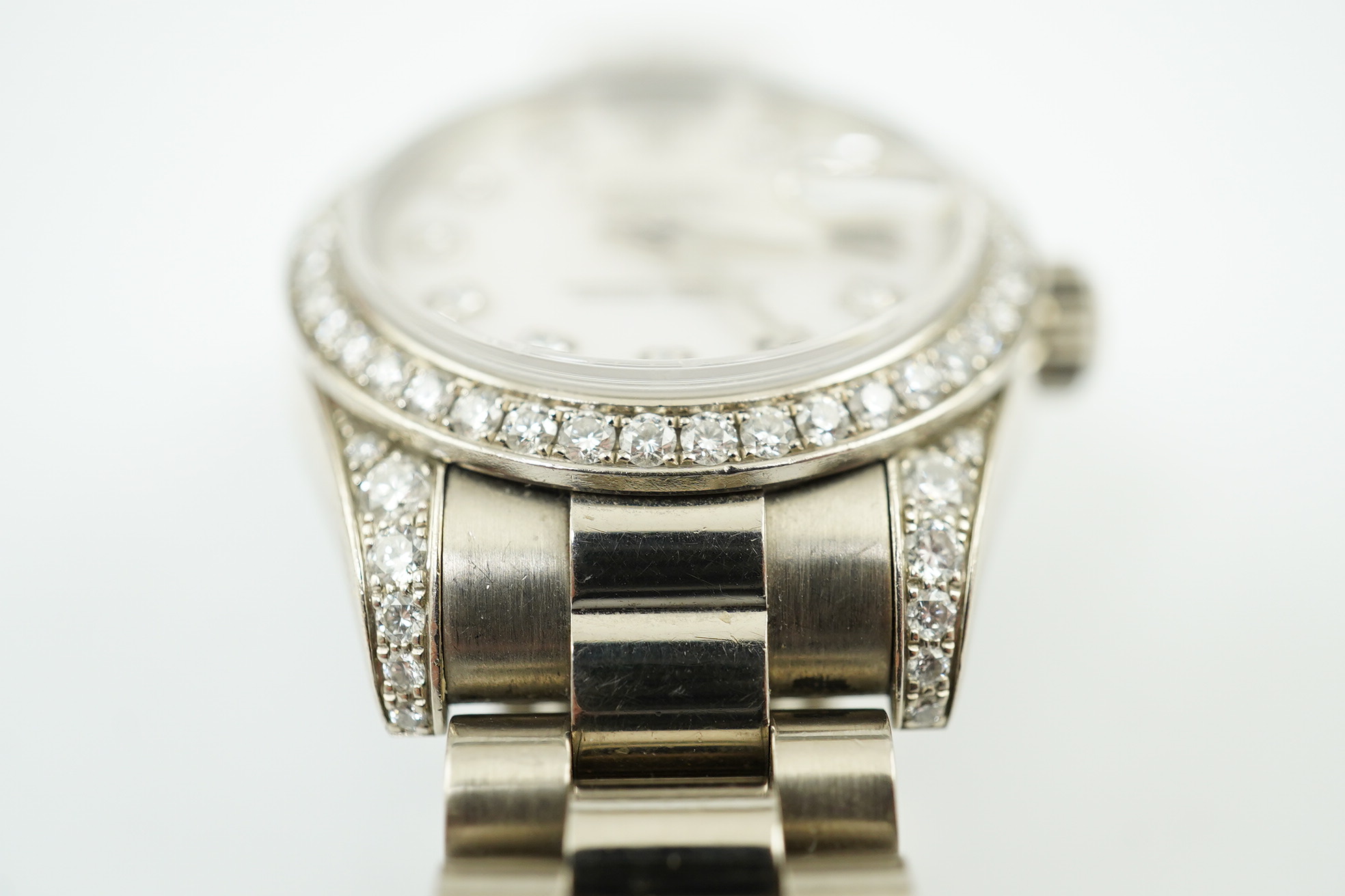 A lady's 2006 18ct white gold and diamond Rolex Oyster Perpetual Datejust wrist watch, on an 18ct white gold Rolex bracelet with deployment clasp